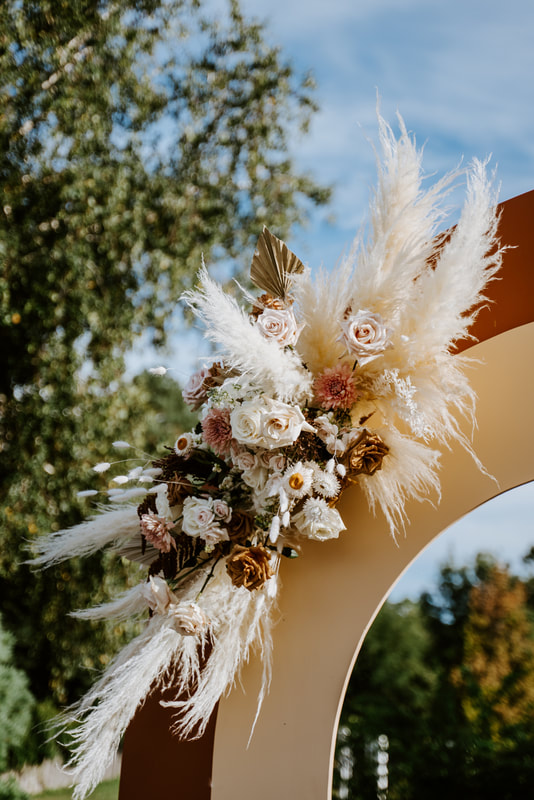 Boho chic wedding flowers neutral dried natural ceremony arch