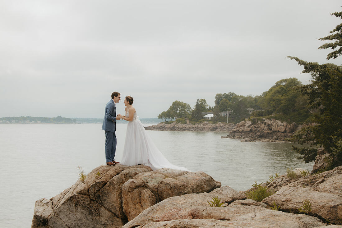 Boston wedding venue bride and groom ocean rocks