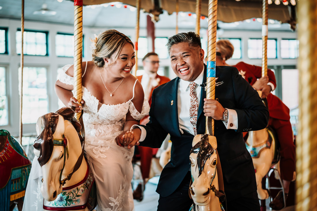 Happy asian couple wedding carousel Rhode Island flowers